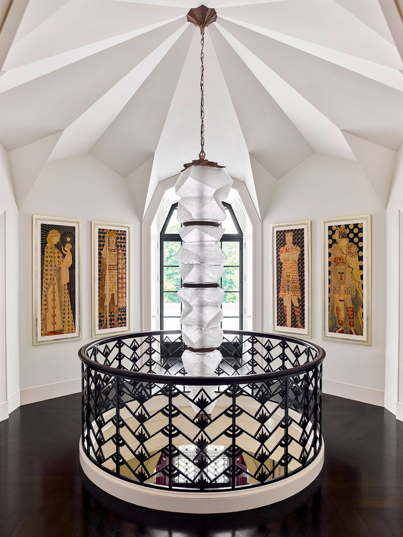 Tribune: A jagged hand-blown cut-glass and cast-bronze light fixture by Thaddeus Wolfe (2015) descends from the faceted planes of the vaulted ceiling. Hung on the angled walls are Josef Engelhart’s pencil-and-watercolor sketches for his Merlinsage frieze (1904).
Photography by Eric Piasecki. Tribune: A jagged hand-blown cut-glass and cast-bronze light fixture by Thaddeus Wolfe (2015) descends from the faceted planes of the vaulted ceiling. Hung on the angled walls are Josef Engelhart’s pencil-and-watercolor sketches for his Merlinsage frieze (1904).
Photography by Eric Piasecki.