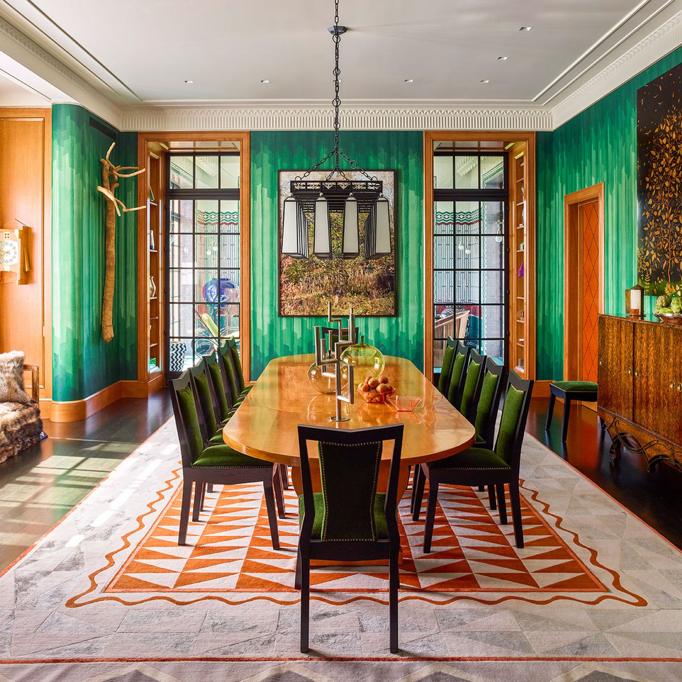 Dining room: PPA Interior Design based the chairs on a design by Josef Gočár; the silk-and-wool rug was inspired by a Gabriel Moiselet painting. The Jean-Michel Frank table was created as part of a larger commission for the Borne family between 1935 and 1940. On the table are a pair of nickel-plated candelabra by Franz Hagenauer, vases by George Sakier (ca. 1930), and Ingeborg Lundin’s Apple vases, designed for Orrefors (ca. 1959). At the far end of the room hangs Philip-Lorca diCorcia’s photograph Upstate (2009)
Photography by Eric Piasecki. Dining room: PPA Interior Design based the chairs on a design by Josef Gočár; the silk-and-wool rug was inspired by a Gabriel Moiselet painting. The Jean-Michel Frank table was created as part of a larger commission for the Borne family between 1935 and 1940. On the table are a pair of nickel-plated candelabra by Franz Hagenauer, vases by George Sakier (ca. 1930), and Ingeborg Lundin’s Apple vases, designed for Orrefors (ca. 1959). At the far end of the room hangs Philip-Lorca diCorcia’s photograph Upstate (2009)
Photography by Eric Piasecki.