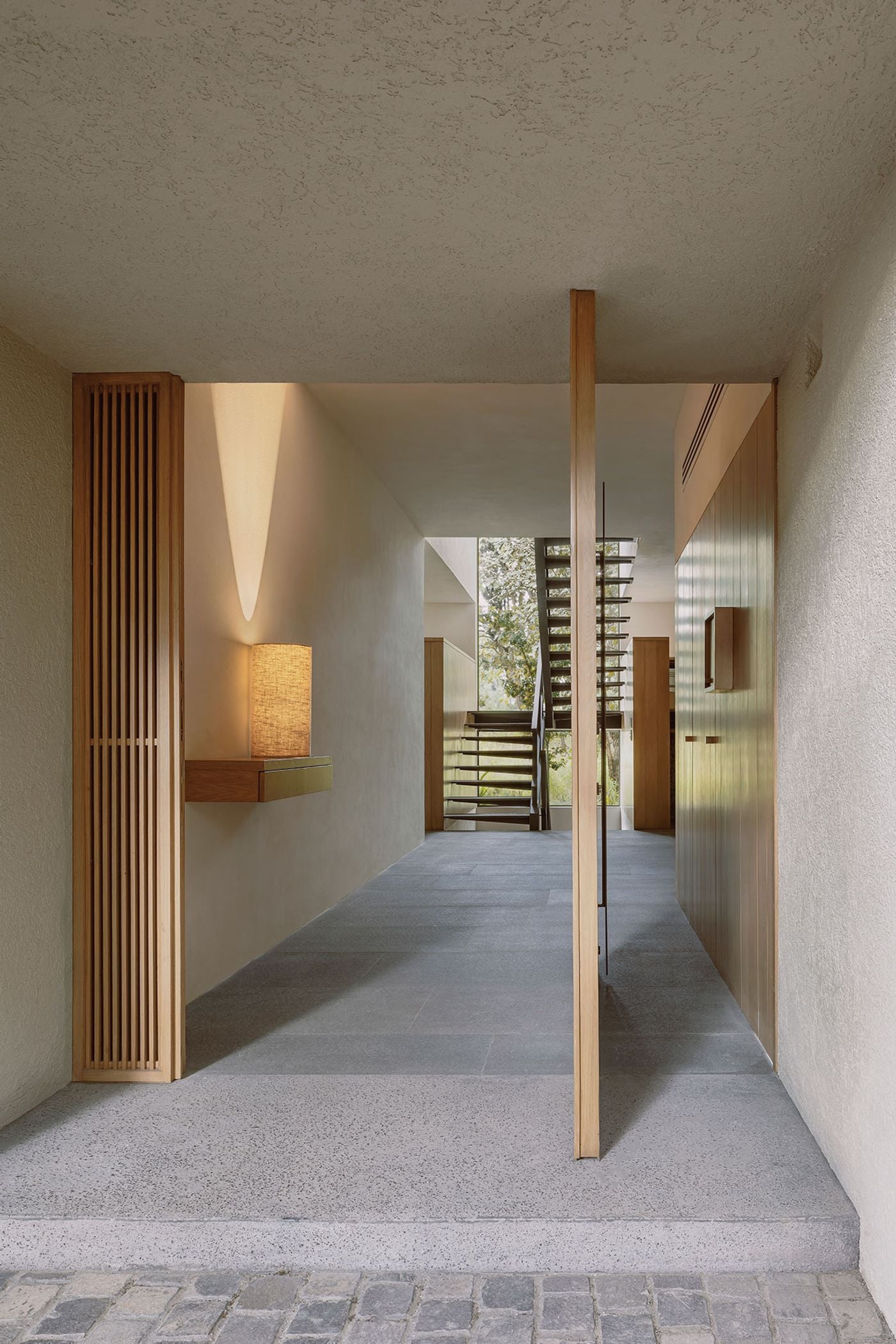 A House in Mexico is Designed as a Transitional Space Between the City ...