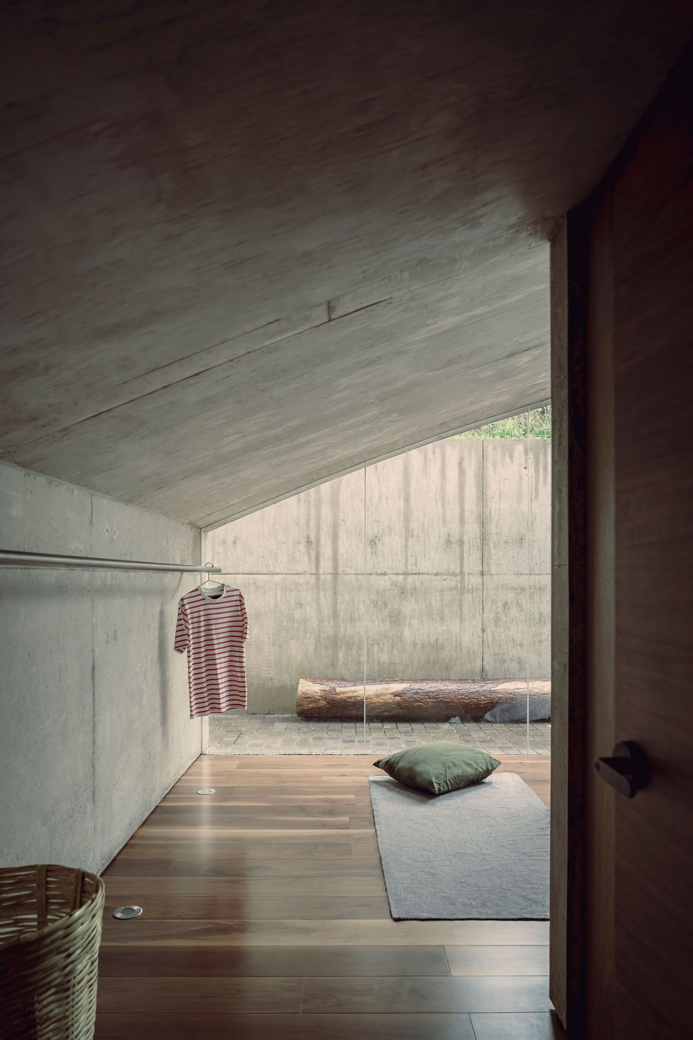 A Minimalist House Embedded in Mexico's Woodlands Explores