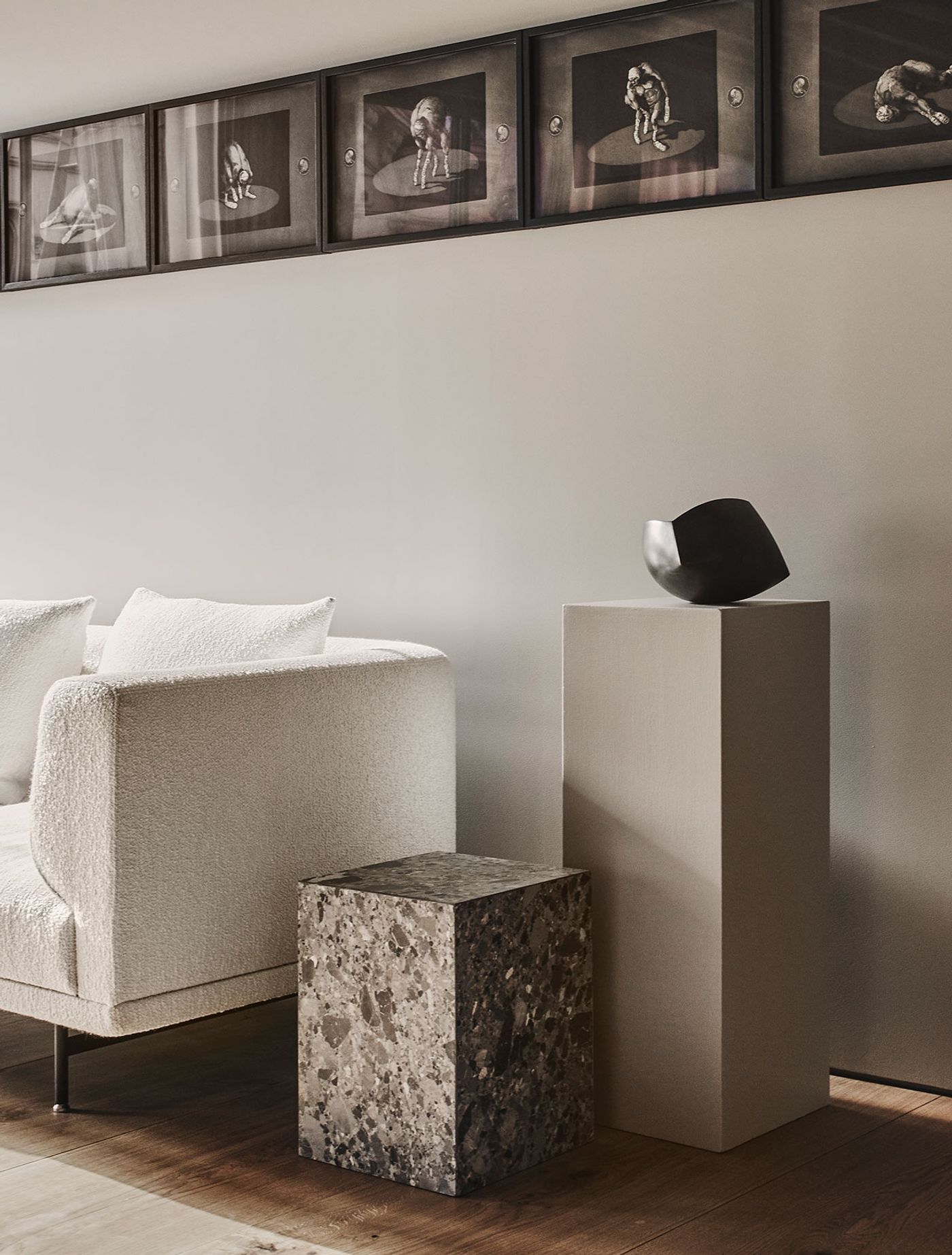 Photography by Adrian Gaut. Styling by Colin King. © Vipp
Featured: Wall artwork by Danish artist Michael Kvium, Vipp Chimney Sofa in Barnum 24 boucle fabric, Farrow &amp; Ball "Drop Cloth" paint.