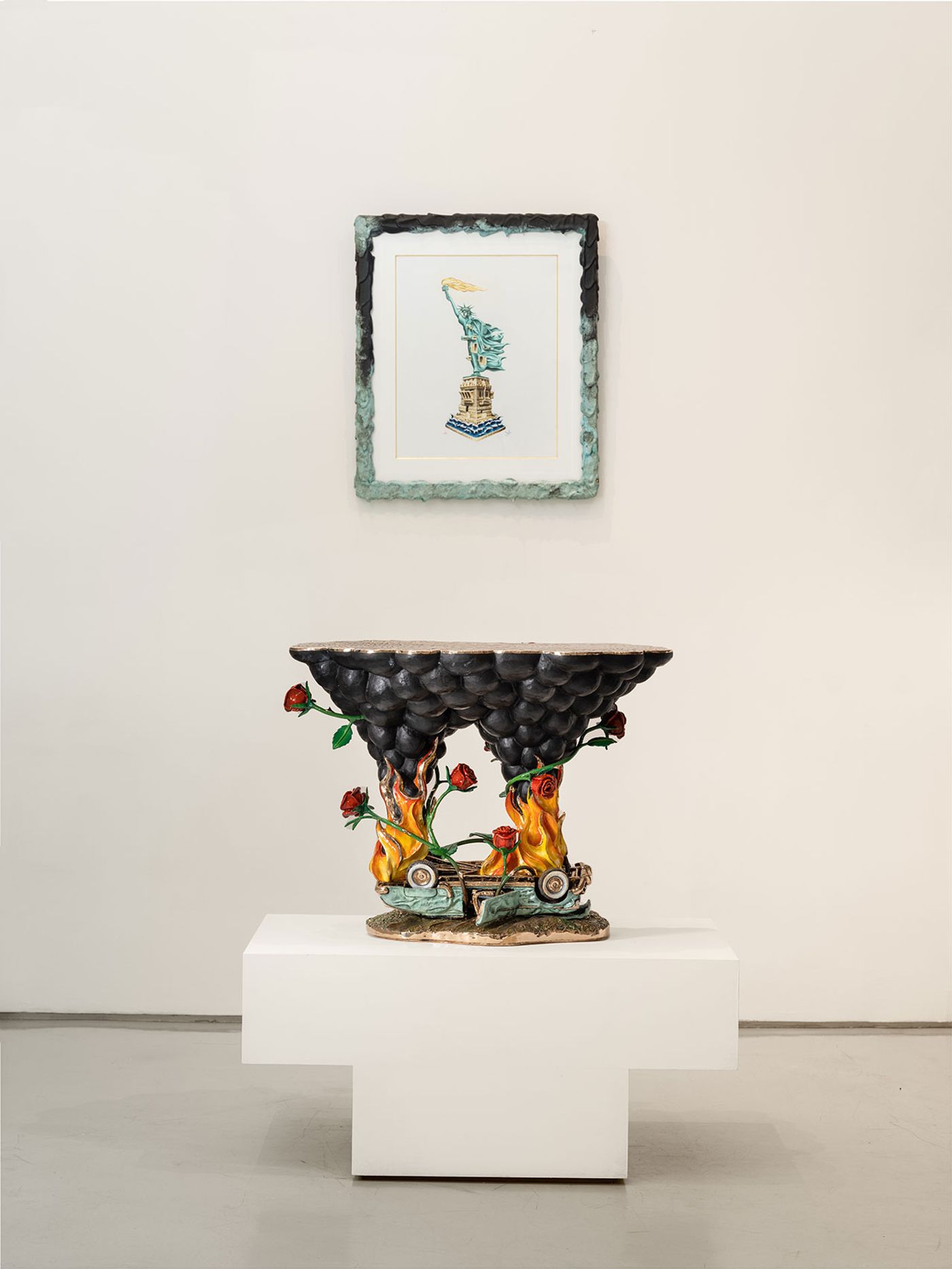 Installation view. "The American Job" by Studio Job at R &amp; Company gallery, New York, Nov 4, 2022 - Jan 27, 2023. Courtesy of Studio Job.
Featured:
Lady Liberty, 2019. Drawing in crayon, felt-tip, ink, and 24k gold on paper. Patinated frame with faceted glass.
Pollock, 2019-2022. Side table in polished, hand-painted bronze and silver and gold leaf. Edition of 8 + 2 APs + Prototype