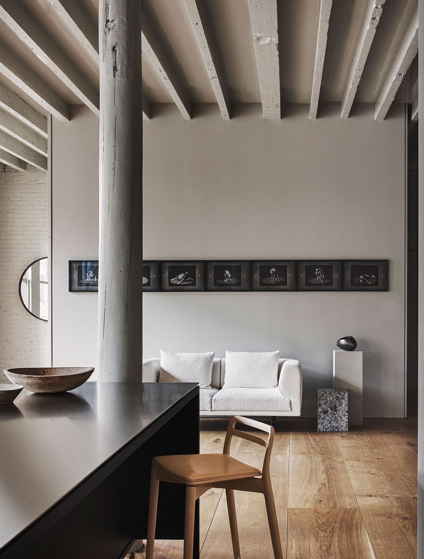 Photography by Adrian Gaut. Styling by Colin King. © Vipp
Featured: Vipp Kitchen Island with Seating Module, artwork by Danish artist Michael Kvium, Vipp Chimney Sofa in Barnum 24 boucle fabric, Farrow &amp; Ball "Drop Cloth" paint.