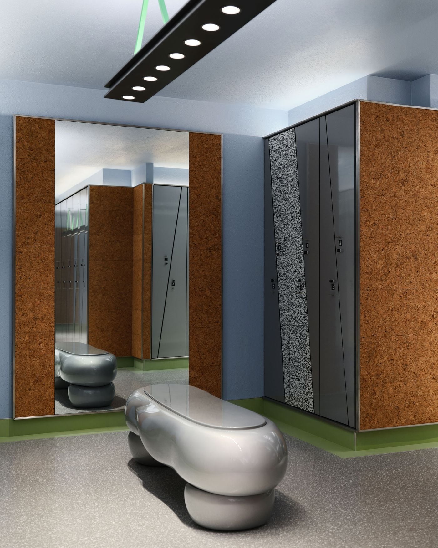 In the women’s locker room, grey metal lockers with angled geometric panels are set against cork walls and a powder-blue envelope, while a glossy sculptural silver bench anchors the space. Acid-green baseboards and black linear lighting sharpen the composition, reinforcing the scheme’s playful take on athletic interiors. In the women’s locker room, grey metal lockers with angled geometric panels are set against cork walls and a powder-blue envelope, while a glossy sculptural silver bench anchors the space. Acid-green baseboards and black linear lighting sharpen the composition, reinforcing the scheme’s playful take on athletic interiors.