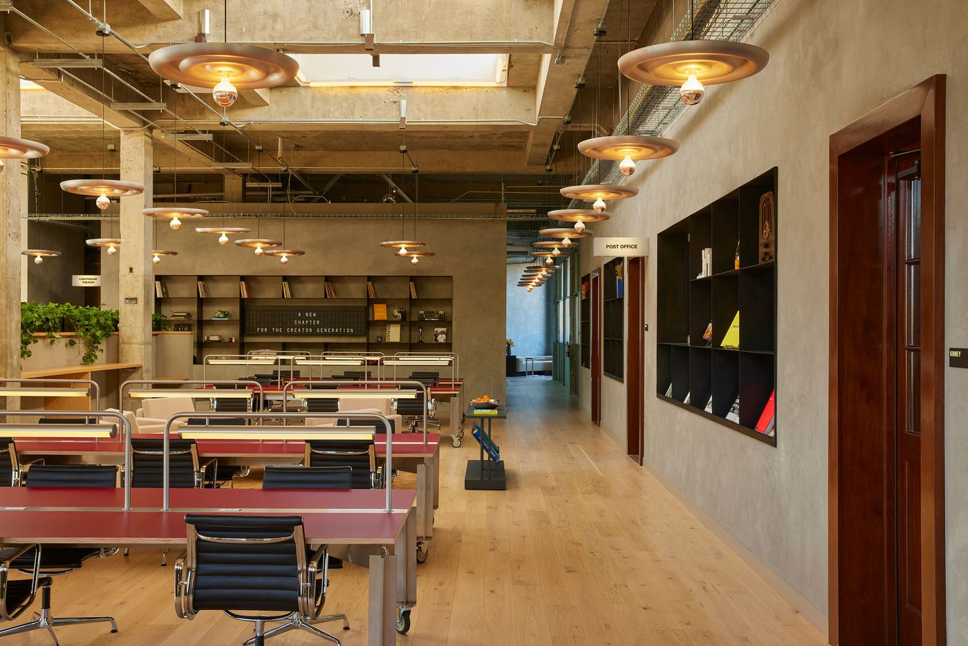 Modern office interior with sleek desks, ambient lighting, and a cozy reading area, featuring a minimalist design and natural wood floors. Modern office interior with sleek desks, ambient lighting, and a cozy reading area, featuring a minimalist design and natural wood floors.