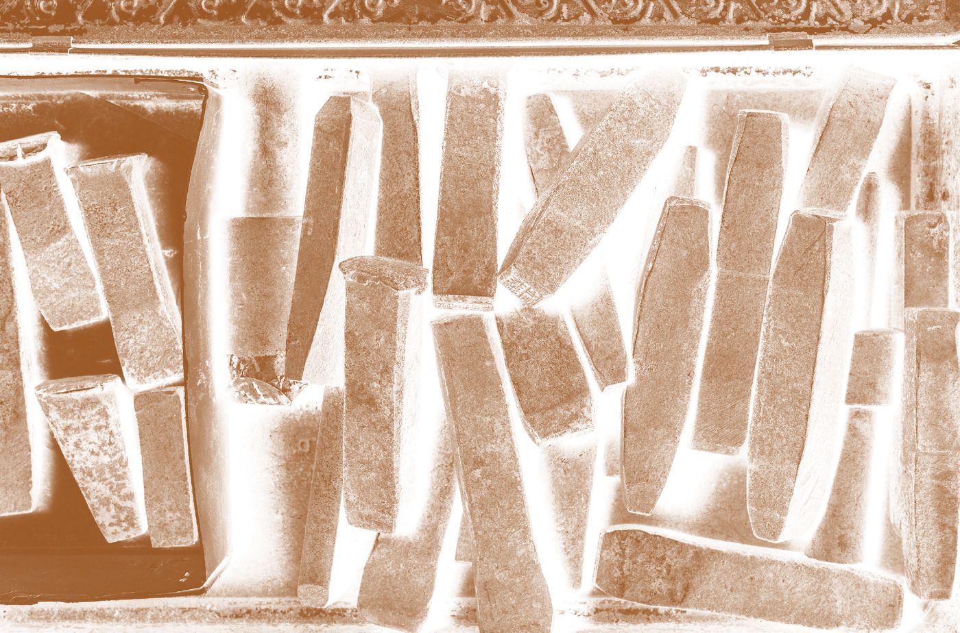 Brass molds scattered like relics of silent craftsmanship. Brass molds scattered like relics of silent craftsmanship.