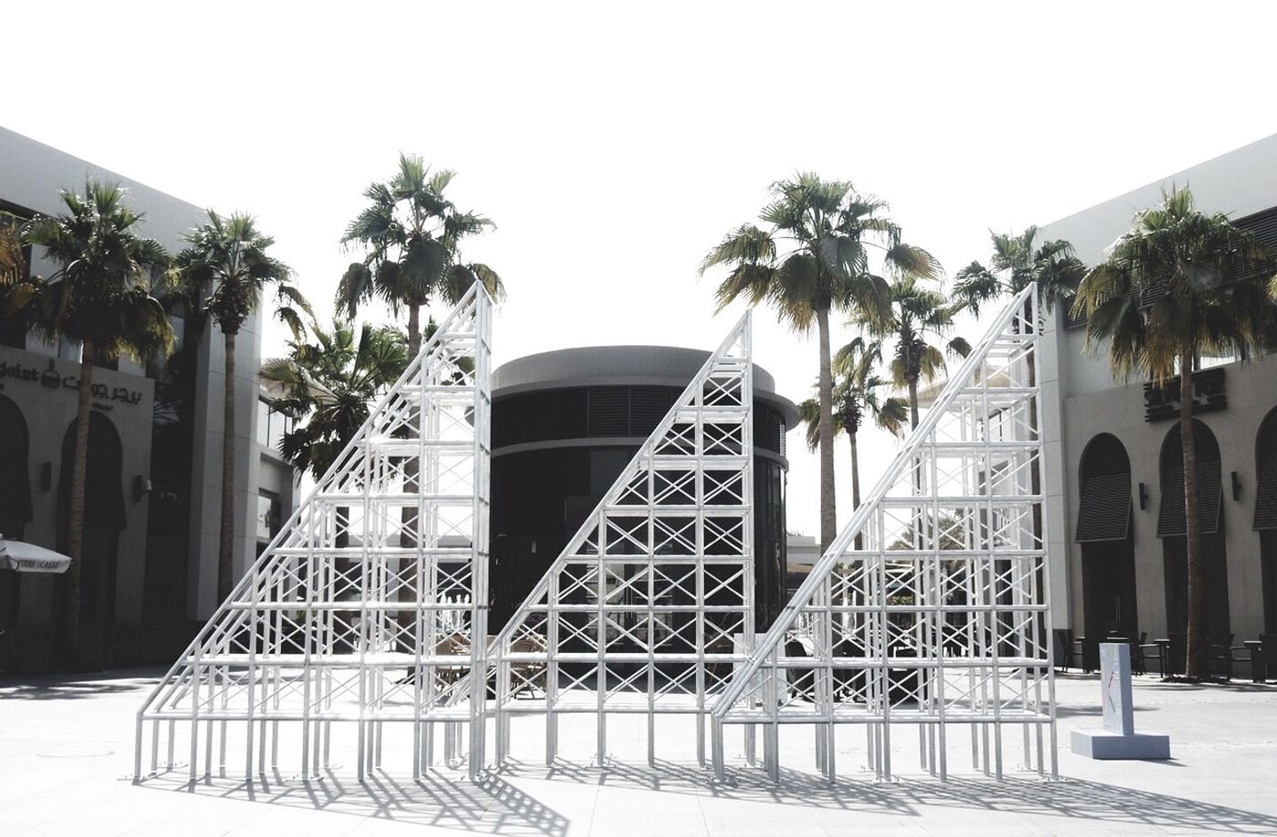 The SCAFFOLDING/ TRUSS.T by Arab conceptual artist Zeinab Al Hashemi, inspired in part by the Emirate’s graceful and historic Arabic dhow sailing boats, and part by Dubai's constant evolution through transformative construction. {TRUSS / trəs/ noun; plural noun: trusses: a framework, typically consisting of rafters, posts, and struts, supporting a roof, bridge, or other structure.} The SCAFFOLDING/ TRUSS.T by Arab conceptual artist Zeinab Al Hashemi, inspired in part by the Emirate’s graceful and historic Arabic dhow sailing boats, and part by Dubai's constant evolution through transformative construction. {TRUSS / trəs/ noun; plural noun: trusses: a framework, typically consisting of rafters, posts, and struts, supporting a roof, bridge, or other structure.}