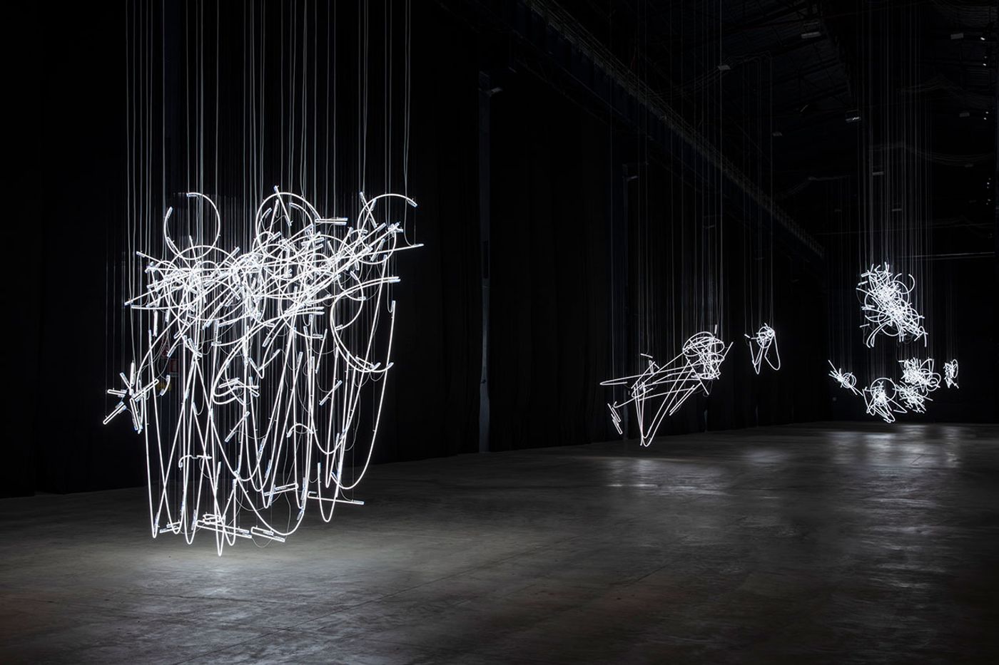 Cerith Wyn Evans, Neon Forms (After Noh), 2015-2019. Installation view at Pirelli HangarBicocca, Milan, 2019. Courtesy of the artist; White Cube; Marian Goodman Gallery, New York, Paris and London, and Pirelli HangarBicocca. Photo: Agostino Osio. Cerith Wyn Evans, Neon Forms (After Noh), 2015-2019. Installation view at Pirelli HangarBicocca, Milan, 2019. Courtesy of the artist; White Cube; Marian Goodman Gallery, New York, Paris and London, and Pirelli HangarBicocca. Photo: Agostino Osio.