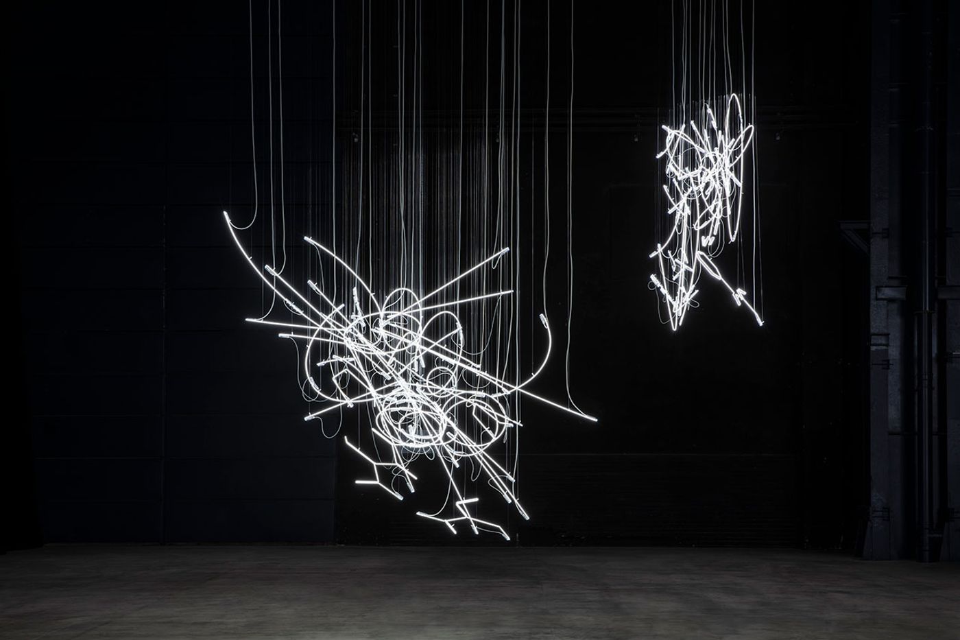 Cerith Wyn Evans, Neon Forms (After Noh), 2015-2019. Installation view at Pirelli HangarBicocca, Milan, 2019. Courtesy of the artist; White Cube; Marian Goodman Gallery, New York, Paris and London, and Pirelli HangarBicocca. Photo: Agostino Osio. Cerith Wyn Evans, Neon Forms (After Noh), 2015-2019. Installation view at Pirelli HangarBicocca, Milan, 2019. Courtesy of the artist; White Cube; Marian Goodman Gallery, New York, Paris and London, and Pirelli HangarBicocca. Photo: Agostino Osio.