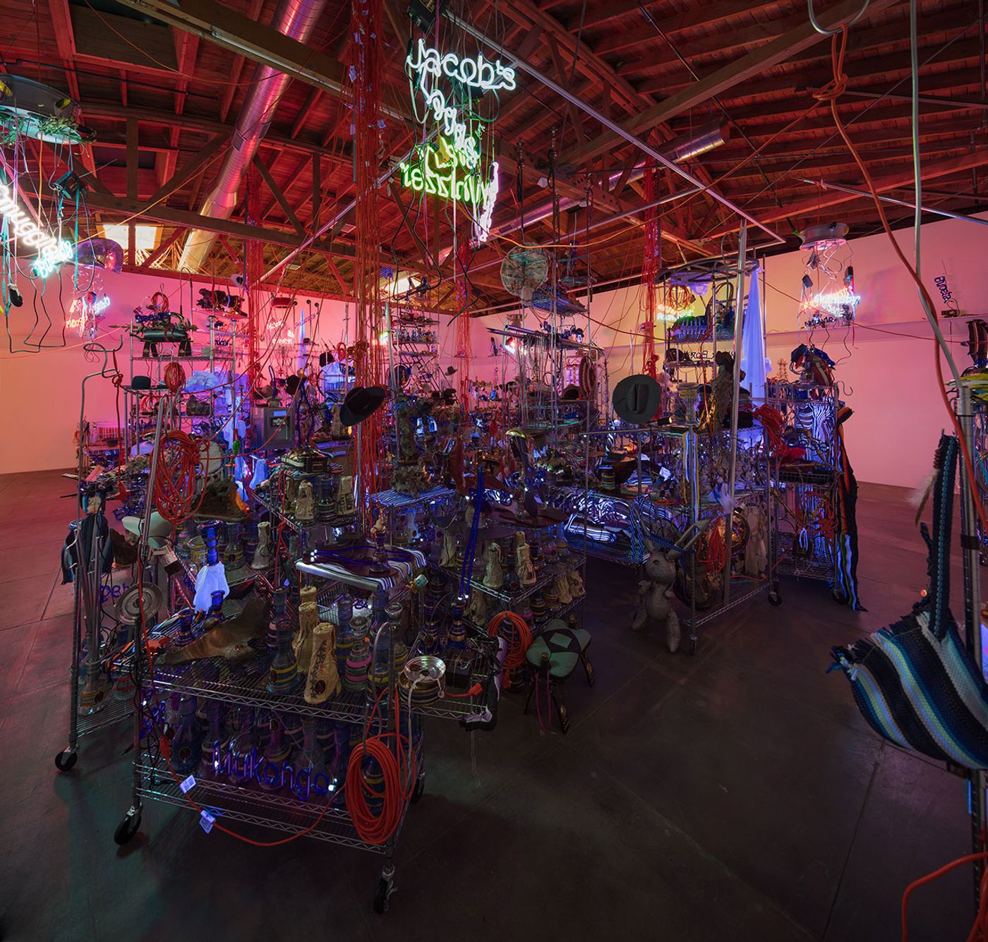 Jason Rhoades, The Black Pussy... and the Pagan Idol Workshop, 2005. Mixed media. Dimensions variable. Installation view, ‘Jason Rhoades. Installations, 1994 – 2006’. Hauser &amp; Wirth Los Angeles, 2017 © The Estate of Jason Rhoades. Courtesy the estate, Hauser &amp; Wirth, David Zwirner and lender. Photo by Fredrik Nilsen.