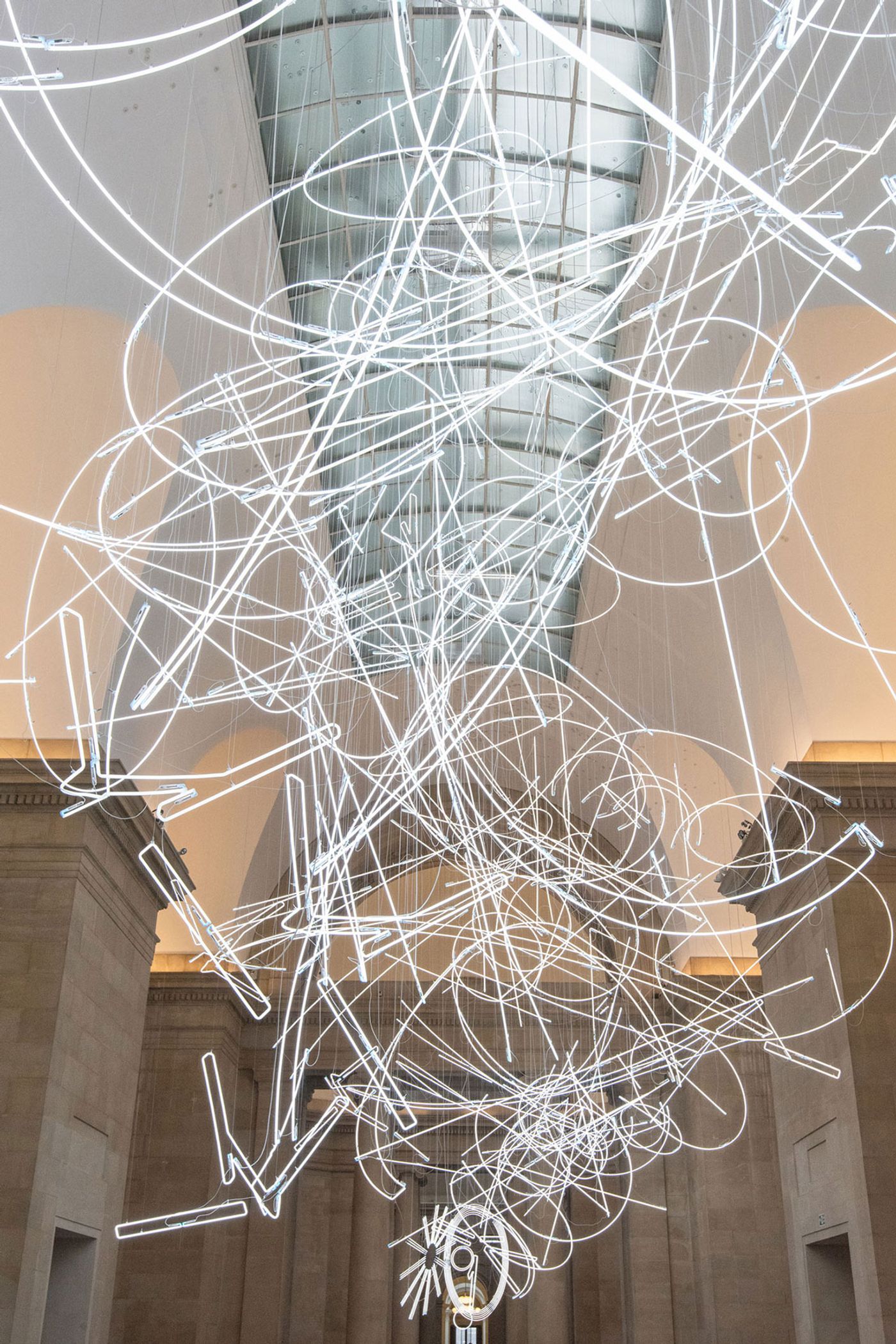 Cerith Wyn Evans, Forms in Space...by Light (in Time), 2017. Tate Britain Commission by Cerith Wyn Evans, Duveen Galleries. © Cerith Wyn Evans, courtesy White Cube. Photo: Joe Humphreys © Tate, London 2018. Cerith Wyn Evans, Forms in Space...by Light (in Time), 2017. Tate Britain Commission by Cerith Wyn Evans, Duveen Galleries. © Cerith Wyn Evans, courtesy White Cube. Photo: Joe Humphreys © Tate, London 2018.