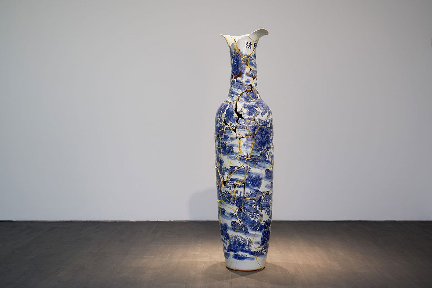 Installation view. Kris Martin, EXIT at S.M.A.K., Ghent, 2020. Photo by Dirk Pauwels.
Featured: Vase, 2005. Chinese porcelain, glue. Gaby and Wilhelm Schürmann Collection, Herzogenrath.
Artist's statement: I broke a Chinese vase and stuck it back together. Breaking and pasting as a metaphor for life. The vase reads in Chinese: The market and the people who go to the market. Installation view. Kris Martin, EXIT at S.M.A.K., Ghent, 2020. Photo by Dirk Pauwels.
Featured: Vase, 2005. Chinese porcelain, glue. Gaby and Wilhelm Schürmann Collection, Herzogenrath.
Artist's statement: I broke a Chinese vase and stuck it back together. Breaking and pasting as a metaphor for life. The vase reads in Chinese: The market and the people who go to the market.