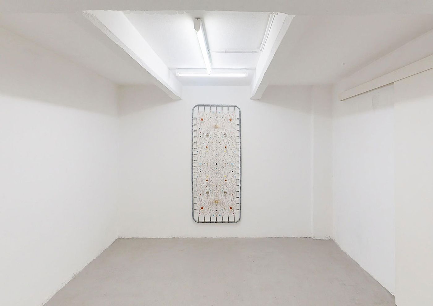 Technological mandala 91 - Come in alto così in basso, 2016. Stainless steel bed frame, springs, Copper wires, electronic components, microchip, speaker, varnish, 195x82x4 cm | 76¾x32¼x1½ inches. Courtesy: The Flat – Massimo Carasi. Photo by The Flat.