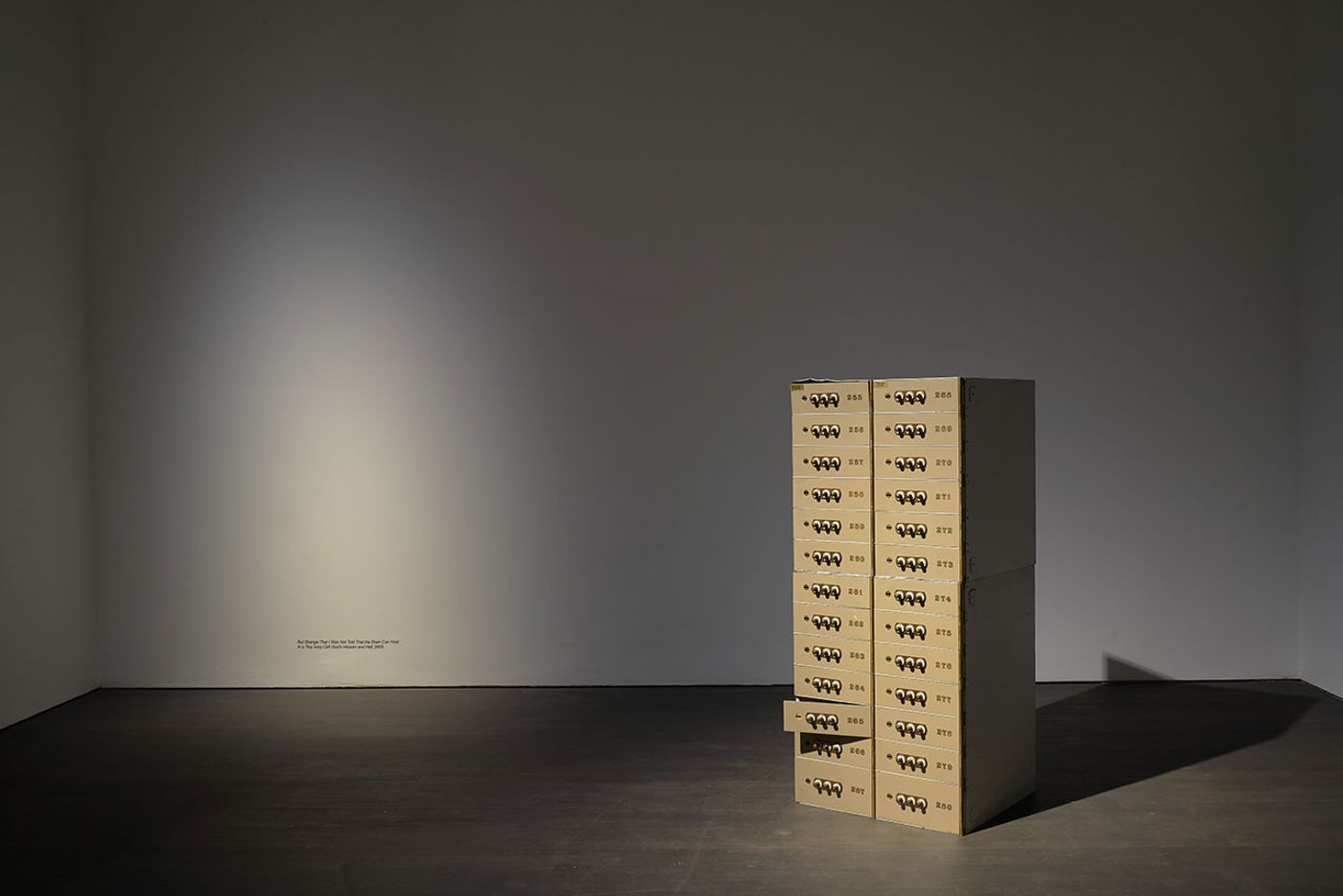 Installation view. Kris Martin, EXIT at S.M.A.K., Ghent, 2020. Photo by Dirk Pauwels.
Featured: But Strange That I Was Not Told That the Brain Can Hold In a Tiny Ivory Cell God’s Heaven and Hell, 2005.
Artist's statement: This quote is by Oscar Wilde and fits perfectly onto the buttons of this safe. The safe door with GOD is open. Installation view. Kris Martin, EXIT at S.M.A.K., Ghent, 2020. Photo by Dirk Pauwels.
Featured: But Strange That I Was Not Told That the Brain Can Hold In a Tiny Ivory Cell God’s Heaven and Hell, 2005.
Artist's statement: This quote is by Oscar Wilde and fits perfectly onto the buttons of this safe. The safe door with GOD is open.