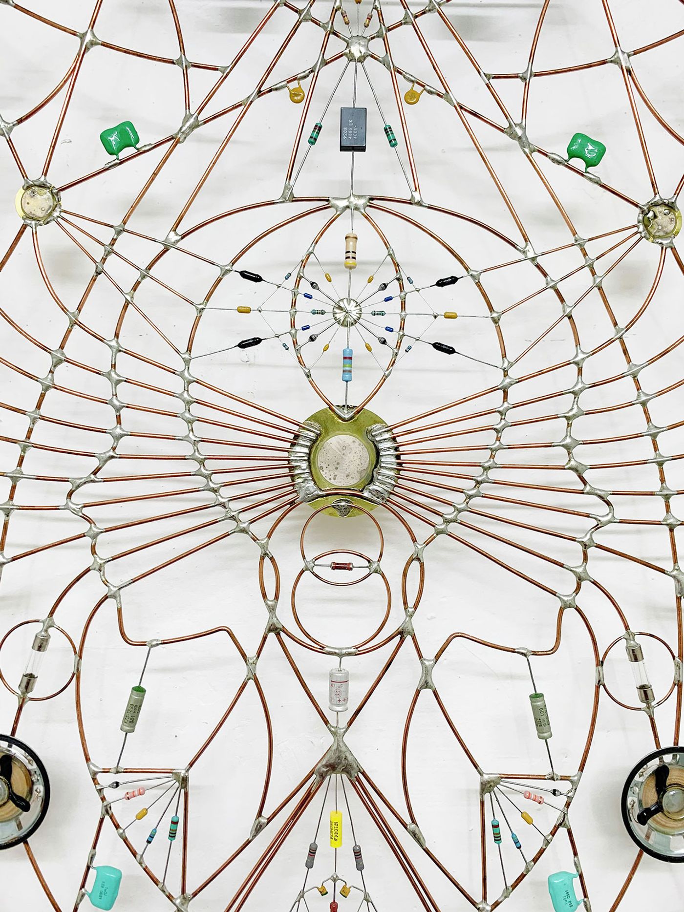 Technological mandala 91 - Come in alto così in basso (close up), 2016. Stainless steel bed frame, springs, Copper wires, electronic components, microchip, speaker, varnish, 195x82x4 cm | 76¾x32¼x1½ inches. Courtesy: The Flat – Massimo Carasi. Photo by The Flat.
