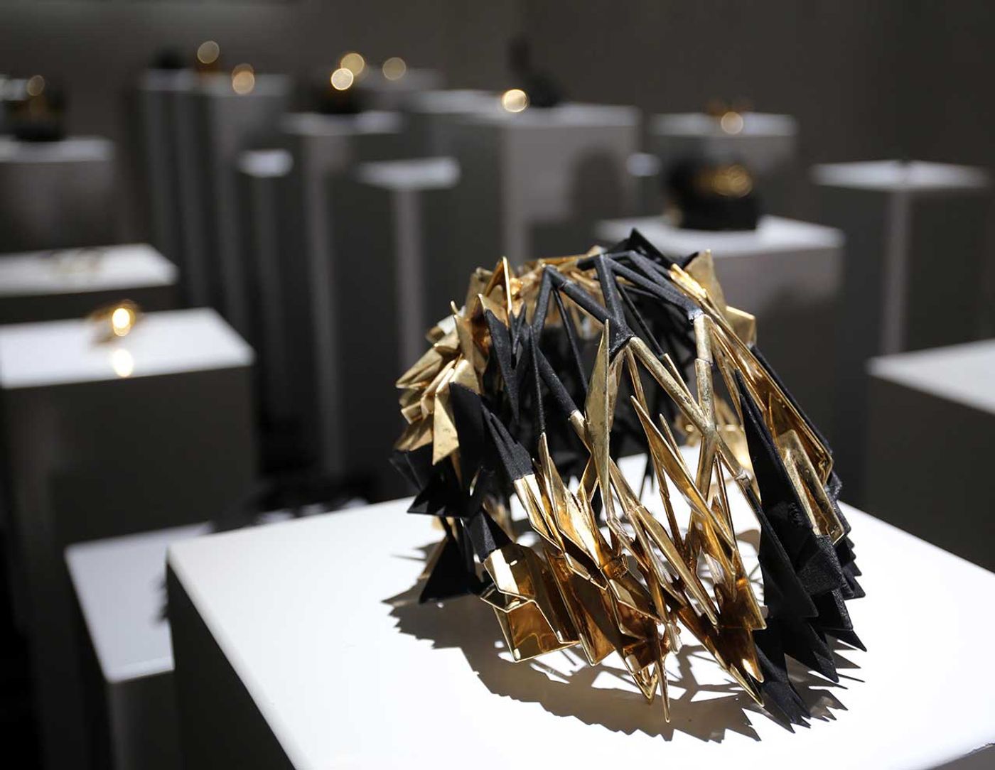 Simon Birch, Gloria Yu, Gabriel Chan and Jacob Blitzer, Crown from Hypercaine room, 2016. Brass, nylon, gold plate, marble, wood, stone, metal. Exhibition view. Photo by Gloria Yu.