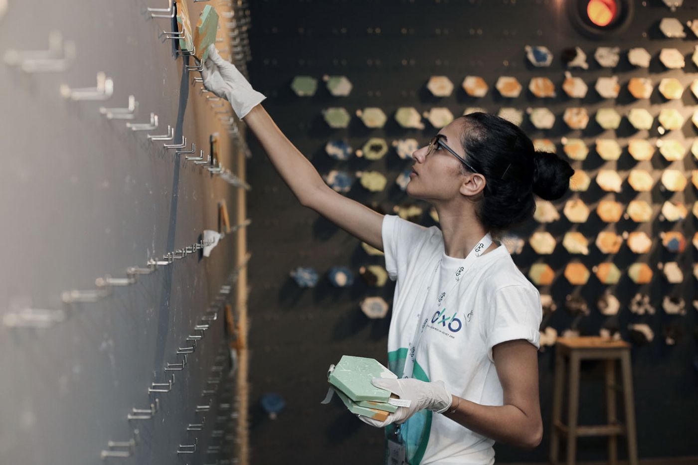 Memoir Bar by Thukral &amp; Tagra ( New Delhi-based design duo Jiten Thukral and Sumir Tagra. Visitors had to pick a memory and write it down on a piece of paper. Shred it into a fine form and watch it being made into a tile.
Memoir Bar. India participation in Dubai Design Week, Abwab 2016.