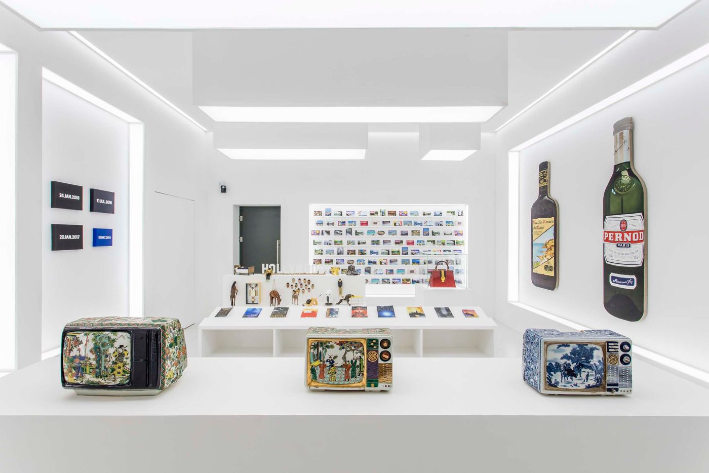 The Artist is Present, Shanghai 2018. Exhibition View. In the foreground porcelain TVs made by artist Ma Jun. The Artist is Present, Shanghai 2018. Exhibition View. In the foreground porcelain TVs made by artist Ma Jun.