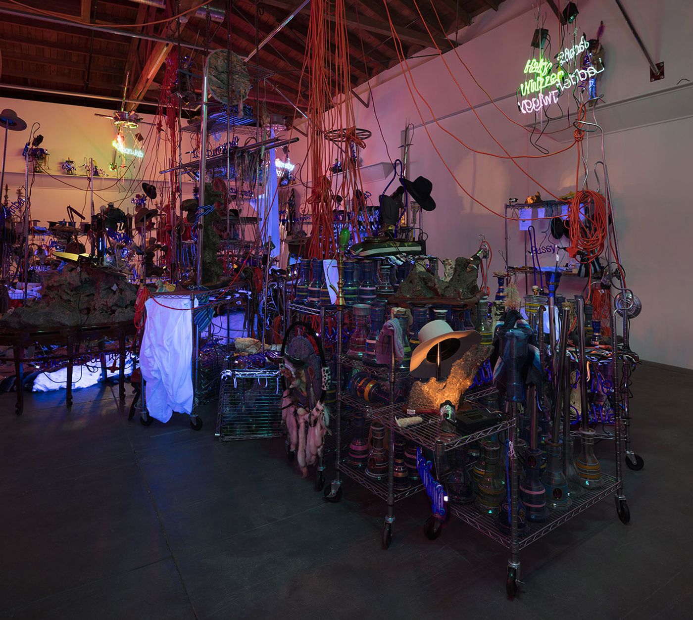 Jason Rhoades, The Black Pussy... and the Pagan Idol Workshop, 2005. Mixed media. Dimensions variable. Installation view, ‘Jason Rhoades. Installations, 1994 – 2006’. Hauser &amp; Wirth Los Angeles, 2017 © The Estate of Jason Rhoades. Courtesy the estate, Hauser &amp; Wirth, David Zwirner and lender. Photo by Fredrik Nilsen.