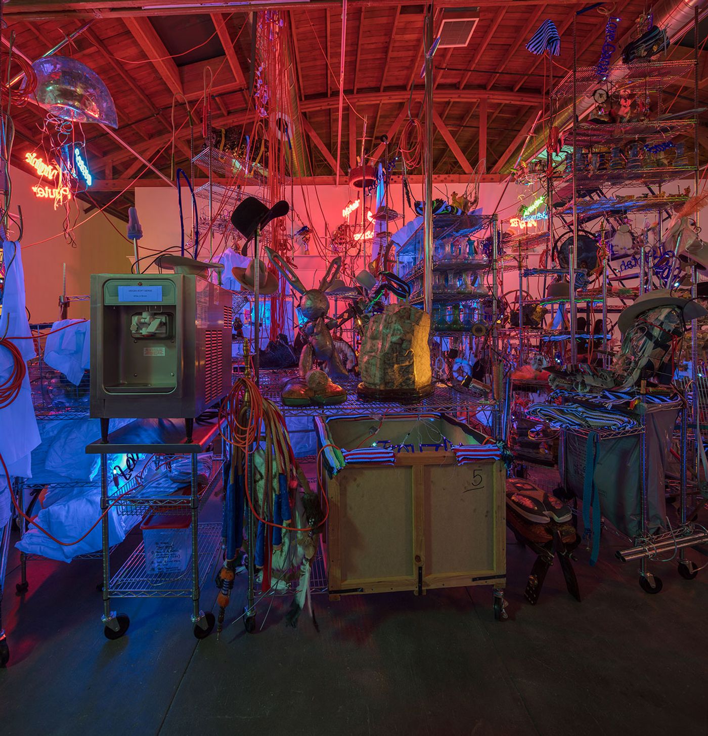 Jason Rhoades, The Black Pussy... and the Pagan Idol Workshop, 2005. Mixed media. Dimensions variable. Installation view, ‘Jason Rhoades. Installations, 1994 – 2006’. Hauser &amp; Wirth Los Angeles, 2017 © The Estate of Jason Rhoades. Courtesy the estate, Hauser &amp; Wirth, David Zwirner and lender. Photo by Fredrik Nilsen.