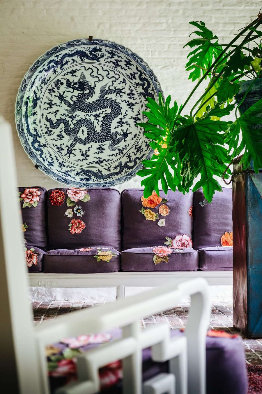 Hand-cut flowers from stray sample materials sewn into sofa. Featured in the book 'Fearless Living'. Photo © JPDEMEYER&CO. Hand-cut flowers from stray sample materials sewn into sofa. Featured in the book 'Fearless Living'. Photo © JPDEMEYER&CO.